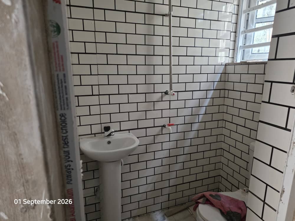 Side view of the bathroom at Achievers Homes